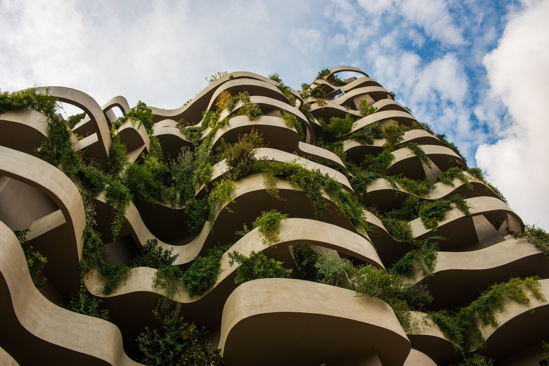 Eco-luxe sustainable real estate development with vertical garden